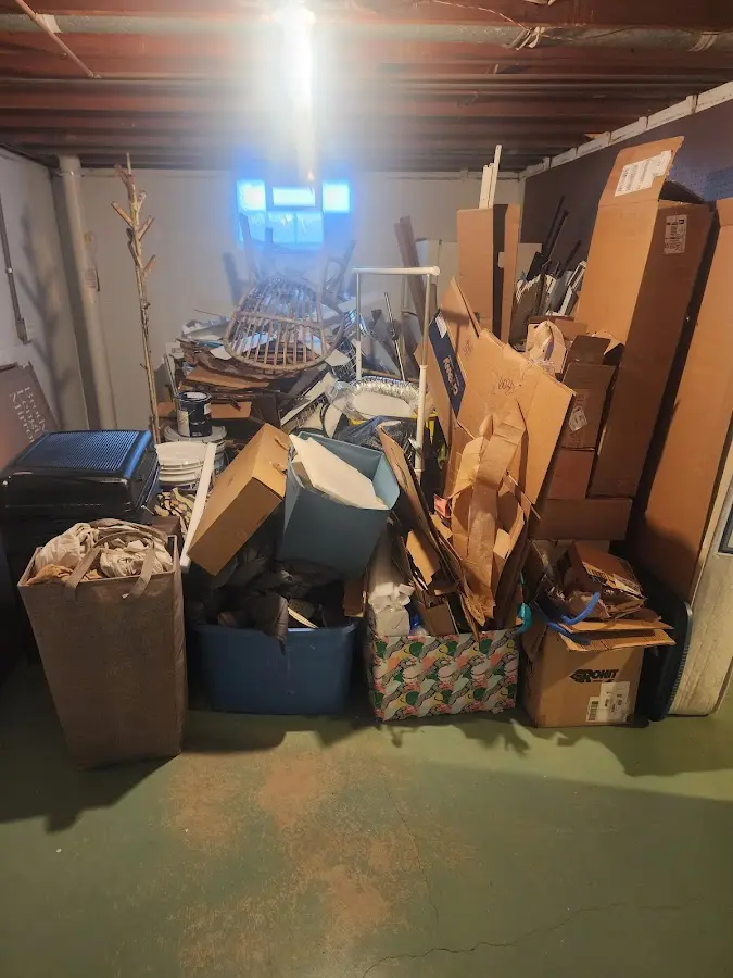 Roll-off dumpster container at job site for Cleanout Dumpster Rental in Boonville